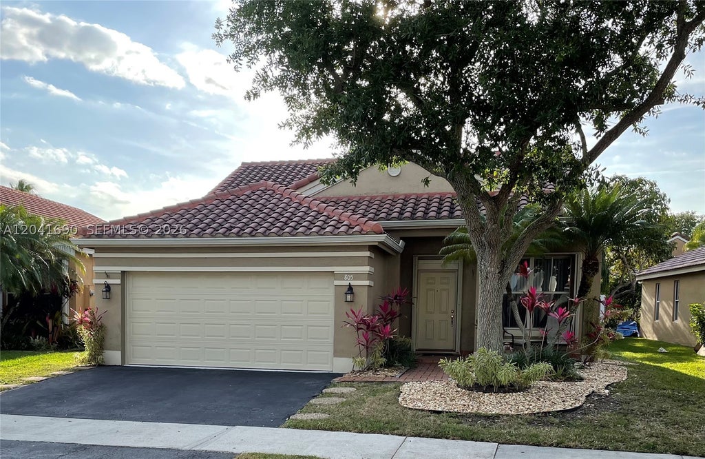 Photo of 805 Falling Water Rd, Weston, FL 33326 (MLS # A12041690)