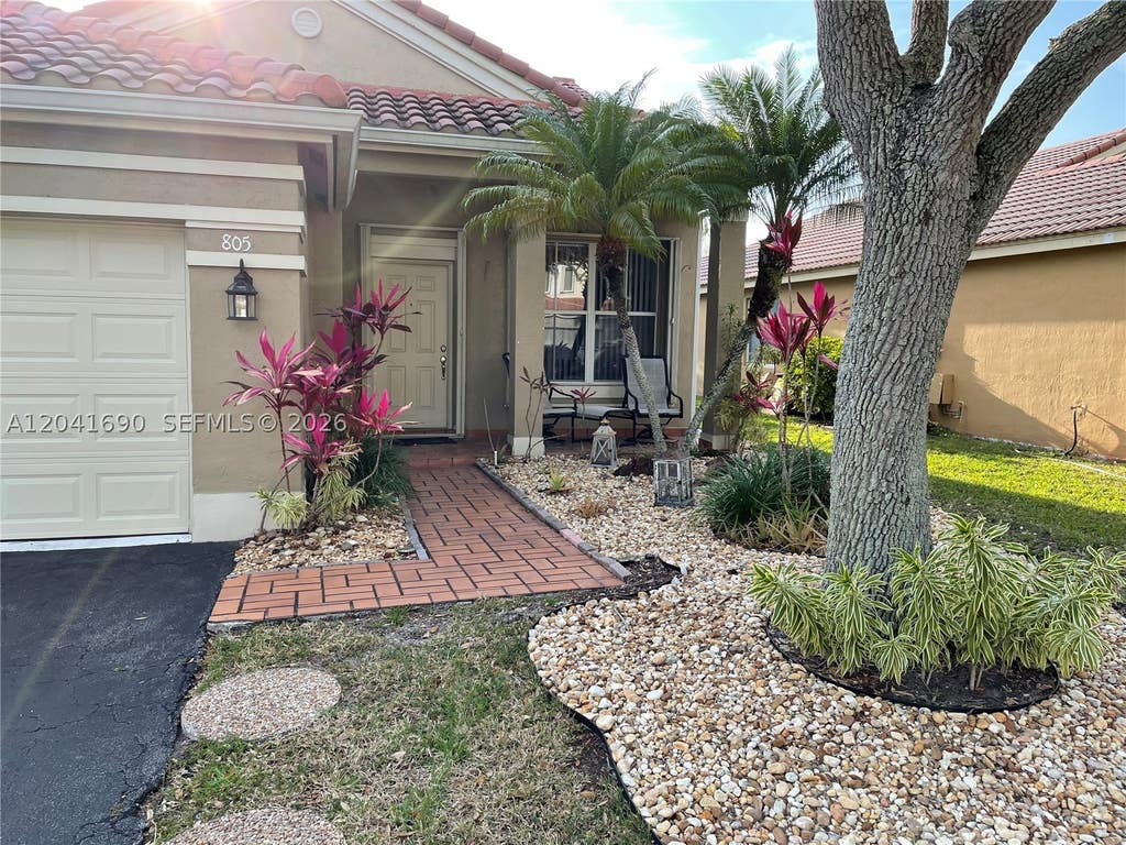 Photo of 805 Falling Water Rd, Weston, FL 33326 (MLS # A12041690)