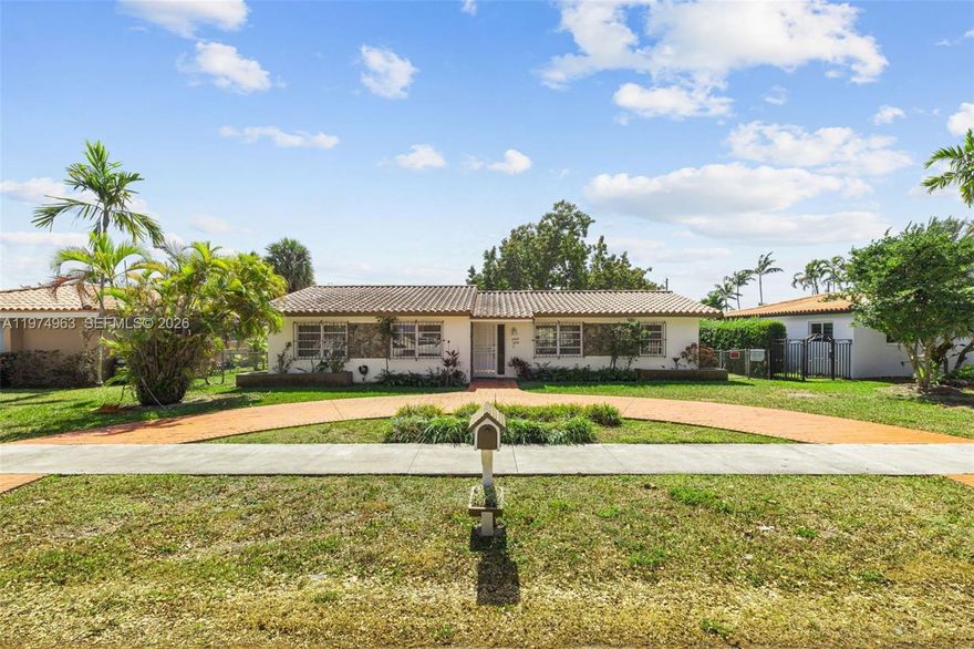 Situated on a generous 7,980 SF lot, this 3BD/2BA home features a convenient circular driveway with ample parking. The primary suite is generous in size and includes a walk-in closet for added convenience. The property also includes an enclosed sunroom with sliding glass doors that create a seamless indoor-outdoor flow, perfect for entertaining or serving as an additional living area. The expansive backyard offers plenty of space and includes a storage shed for added functionality. With great potential and room to make it your own, this home presents an excellent opportunity in a well-established neighborhood.