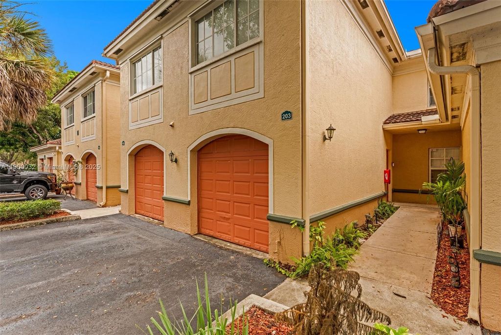 Photo of 2464 Centergate Dr #203, Miramar, FL 33025 (MLS # A11900032)