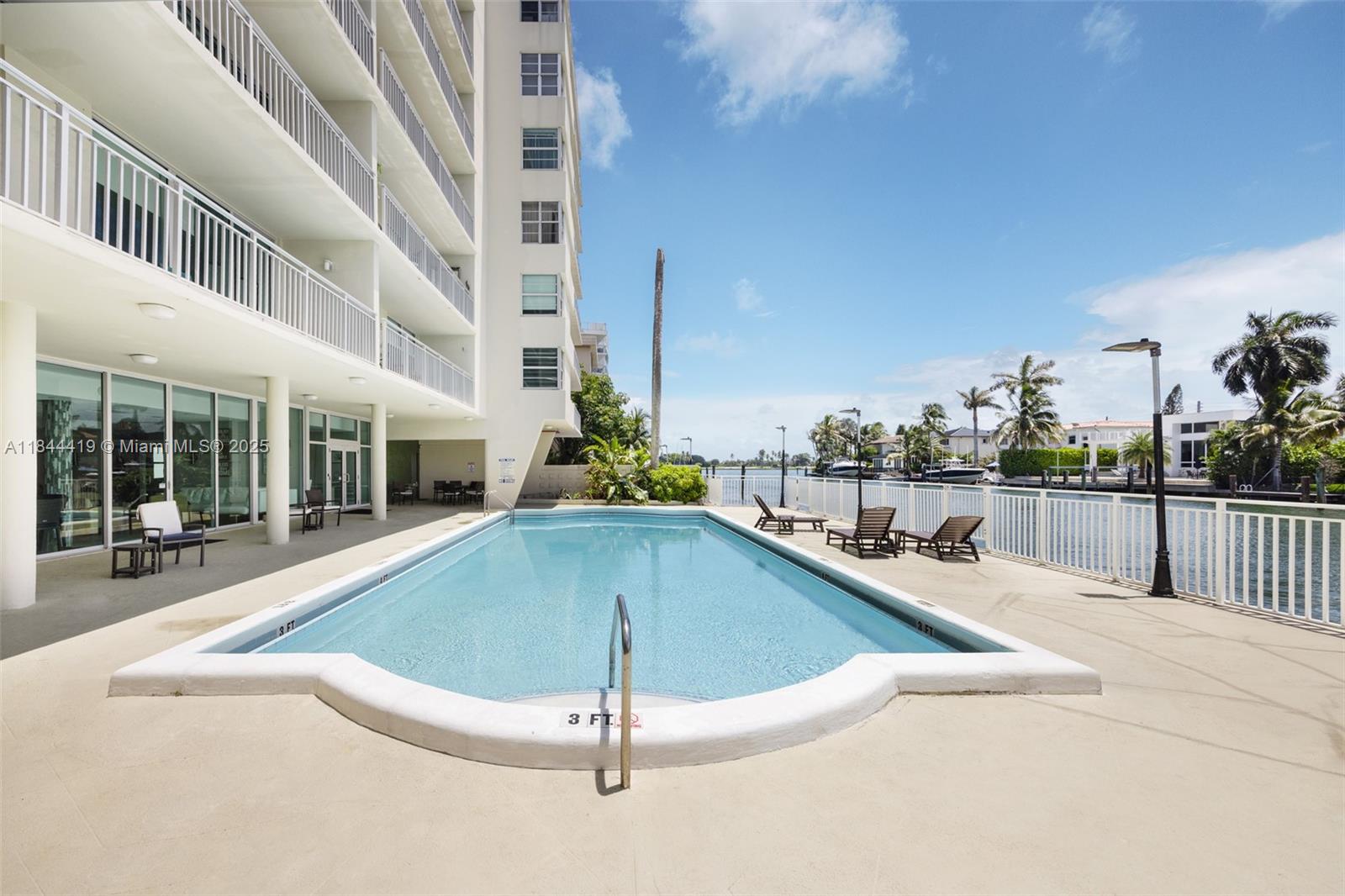 Beautifully renovated 1-bedroom, 1.5-bath residence in desirable Bay Harbor Islands. The oversized primary suite includes an en-suite bath and generous closet space, while the thoughtful layout offers a large pantry, updated kitchen, and spacious living area. Step onto your private balcony to enjoy morning coffee or unwind with tranquil neighborhood views. A newly installed A/C unit adds to the home’s turnkey appeal. Additional storage located in the lobby. Enjoy water views from the heated pool and community areas, all just minutes from Bal Harbour Shops, pristine beaches, and top-rated schools.