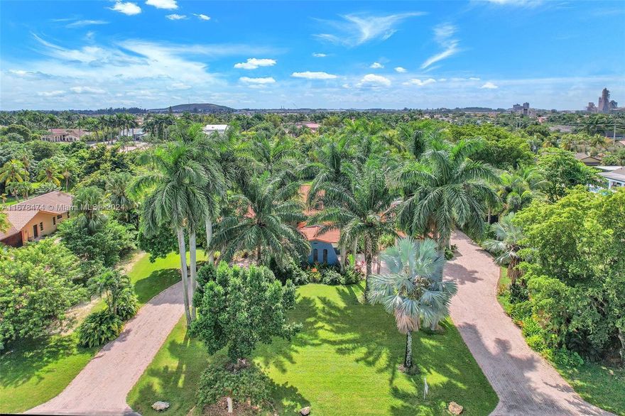 Welcome to "Costa Rica Paradise"! This stunning 5-bedroom, 4.5-bath home sits on a 1.13 acre lot with 6,106 sq ft total of luxury, perfect for entertaining. Enjoy two kitchens and two full laundry rooms. The single-story layout features a loft and soaring ceilings, with two wings designed for multi-generational living, an in-law suite, or an art/musician studio. Outside, relax on the expanded covered terrace with a BBQ area, and enjoy the new custom pool deck with jacuzzi, plus a BRAND NEW GUEST HOUSE AND CAR GARAGE. The home includes 60 solar panels and a generous storage shed. Located on a quiet street with a circular driveway and porte-cochère, it's a true haven. A+ schools, plus shopping, restaurants, and major highways nearby. Park your toys! NO HOA!! Schedule your showing today!