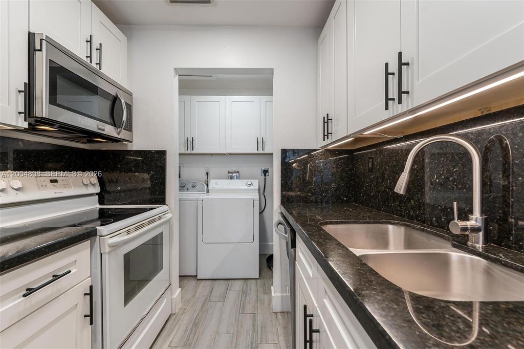 Photo of 130 NW 57th St #1, Oakland Park, FL 33309 (MLS # A12004898)