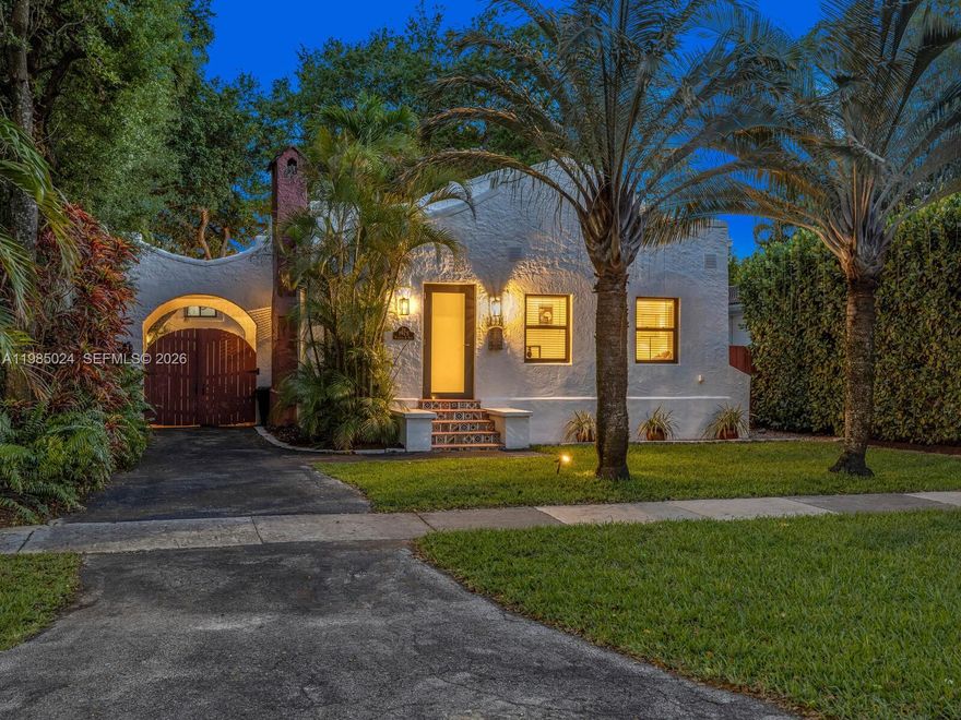 One property. Three distinct living spaces—a main house plus a two-story guest house with two separate guest units! Welcome to Villa Serenata—a rare 1925 Mission-style compound in Miami Shores offering a 3BD/2BA main residence and a detached two-story casita with TWO fully independent units—ideal for multigenerational living, guests, home office, fitness, or more. Much like a serenade drifting through the evening air, this romantic Mediterranean-inspired retreat unfolds with graceful rhythm, warmth, and timeless architectural detail. The 1,463 SF main home features bamboo wood floors, a sun-filled Florida room perfect for a lounge or office, and a living room with original fireplace and elegant columned archway leading to the formal dining area. The updated kitchen includes marble countertops, a breakfast bar, and a bright window-wrapped breakfast nook. Outdoors, enjoy a lush oak-canopied entertaining oasis with an entertainment esplanade, plenty of green space, and room for a pool. The 800 SF two-story casita offers two separate legal “apartments” with updated baths and kitchenettes plus storage. All in a fantastic non-flood zone location, just blocks to Downtown Miami Shores.