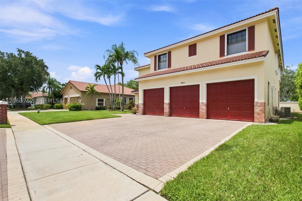 Photo of 344 SW 159th Ln, Pembroke Pines, FL 33027 (MLS # A12063752)