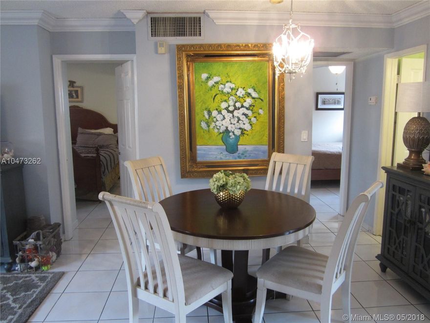 Fabulous investment opportunity in this 2 bed 2 bath 755 sq. ft. unit in the popular and sought after Residencial el prado complex in Hialeah.   Features of this move in ready unit include:  tons of natural lighting throughout, renovated kitchen with S-S appliances, large balcony, new TITAN tank less water heater, crown molding, separate laundry room, ample closet space, new ceiling fans in each room, hurricane shutters and more.   Unit comes with 1 assigned parking space and 2 guest spots.    Close to restaurants, shopping, highways and the airport.  Easy to show and come make this condo your new home.