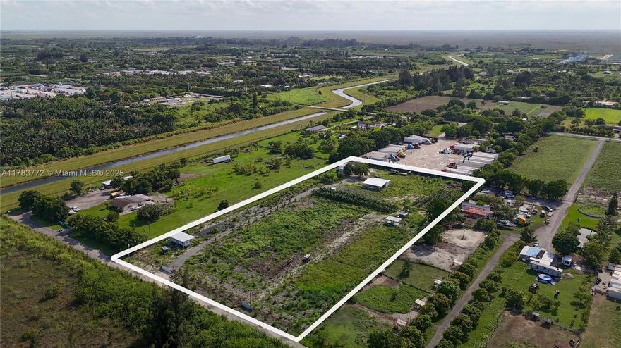 Income producing 5 acre nursery in Redland's agricultural zone. Fenced, septic & electricity on site. Partially leased. Zoned agricultural no truck parking. Zoning will not allow for a single family home or truck parking only nursery or similar business.