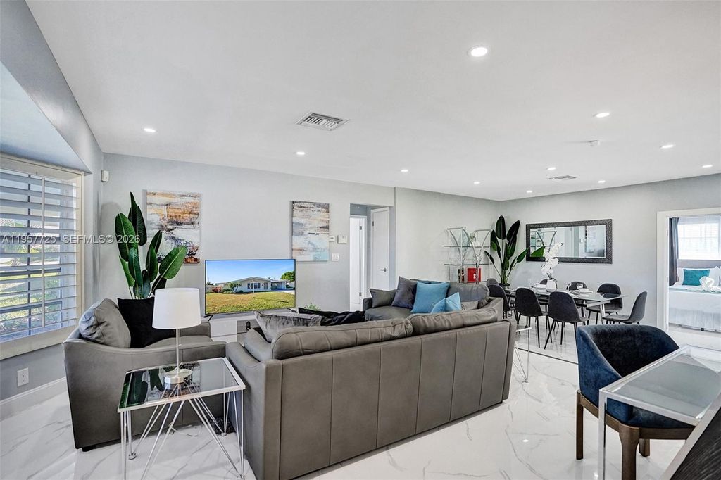 Photo of 477 SE 17th Ter, Deerfield Beach, FL 33441 (MLS # A11957725)