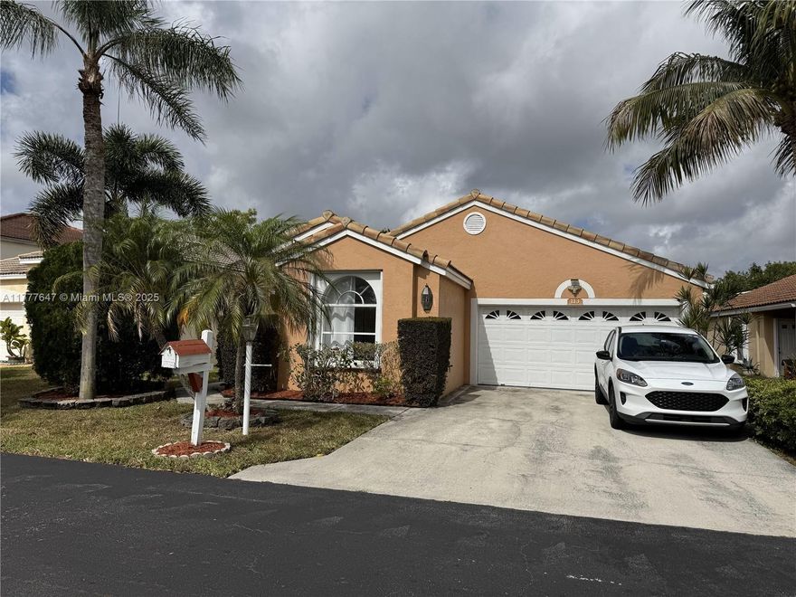 Beautiful 3/2 featuring tile floor throughout, updated kitchen with stainless steel appliances and wooden cabinetry, updated baths and lovely yard for entertaining.