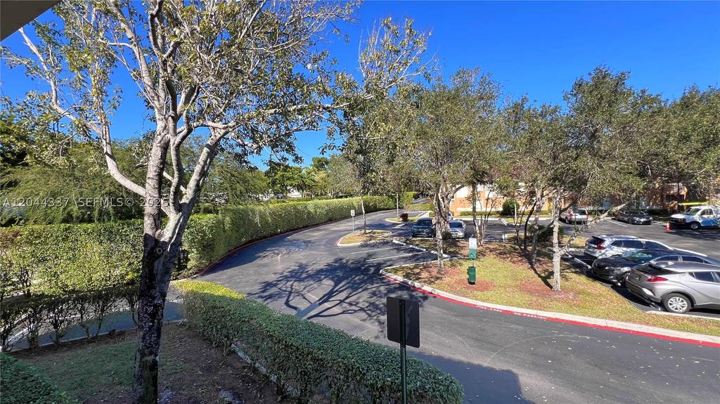 Photo of 757 NW 92nd Ave #757, Plantation, FL 33324 (MLS # A12044337)