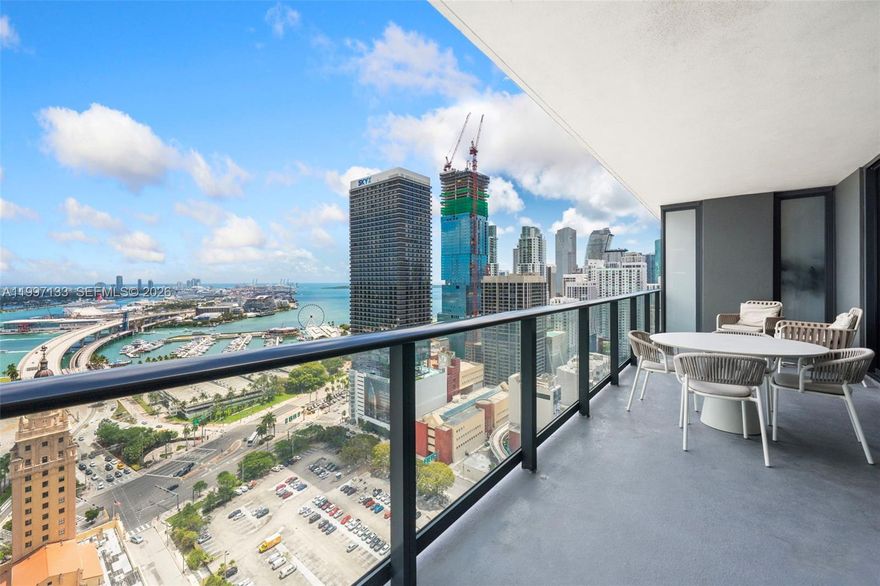 Fully furnished and strong revenue-producing high-floor NE corner unit at Natiivo Miami with 3 bedrooms and 2.5 bathrooms, offering panoramic direct water and city skyline views from a large balcony. This bright and spacious residence features an open-concept layout, en-suite bathrooms, and in-unit washer and dryer. Currently enrolled in the hotel program, the unit allows daily rentals, ideal as a luxury vacation home or income-generating investment.

Residents and guests enjoy resort-style amenities including a rooftop pool with panoramic views, state-of-the-art fitness center, luxury spa with traditional Hammam, restaurants, cafés, bar, lounge areas, and valet parking. The building permits daily, weekly, and monthly rentals.

Located in the heart of Downtown Miami, steps from Bayfront Park, Miami Worldcenter, Kaseya Center, Bayside Marketplace, museums, theaters, restaurants, nightlife, and the Brightline station. This residence benefits from one of Miami's strongest short-term rental markets, driven by tourism, major events, concerts, and international visitors.