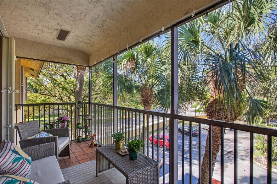 STUNNING CORNER UNIT WITH VAULTED CEILINGS & OPEN LAYOUT! Light-Filled Condo Featuring Soaring Ceilings and an Open-Concept Living/Dining Area Ideal for Everyday Living and Entertaining. Kitchen Flows Seamlessly into Main Living Space. Newer Flooring Throughout, Spacious Bedrooms, and Updated Bathroom with Modern Vanity.

Private Screened-In Balcony with Storage Closet—Perfect for Relaxing. Primary Suite Offers Walk-In Closet + Attic Access for Extra Storage. Generously Sized Second Bedroom with Flexible Use.

Additional Features Include Newer Full-Size Washer & Dryer In-Unit, Newer A/C System, and Accordion Hurricane Shutters.

Located in a Pet-Friendly, All-Ages Community with Pool, Clubhouse, Fitness Center, and Tennis Courts. Centrally Located Near Parks, Major Highways, Beaches, Shopping, Dining, and Airports.

Move-In Ready and Easy to Show—Schedule Your Tour Today!