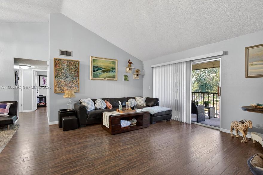 Stunning Corner Unit Condo featuring High Vaulted Ceilings and an Open-Concept Layout filled with Tons of Natural Light. The Kitchen seamlessly flows into the Spacious Living and Dining Areas, creating an ideal setting for both everyday living and entertaining.

This home offers Newer Flooring Throughout, Spacious Rooms, and an Updated Bathroom with a Modern Vanity. Step out onto your Private Screened Balcony—perfect for enjoying fresh air—with a Convenient Storage Closet.

The Primary Suite features a Walk-In Closet along with Attic Access for Extra Storage, and the Second Bedroom is Generously Sized and versatile.

Additional highlights include a Newer Full-Size Washer and Dryer In-Unit, a Newer A/C System, and Accordion Hurricane Shutters for added protection and peace of mind.

Located in a Pet-Friendly, All-Ages Community offering Resort-Style Amenities including a Pool, Clubhouse, Fitness Center, and Tennis Courts.

Centrally Located near Parks, Major Highways, Beaches, Shopping, Dining, Places of Worship, and Airports.


Comfort, Convenience, and South Florida Living at its Best! Schedule Your Tour Today!