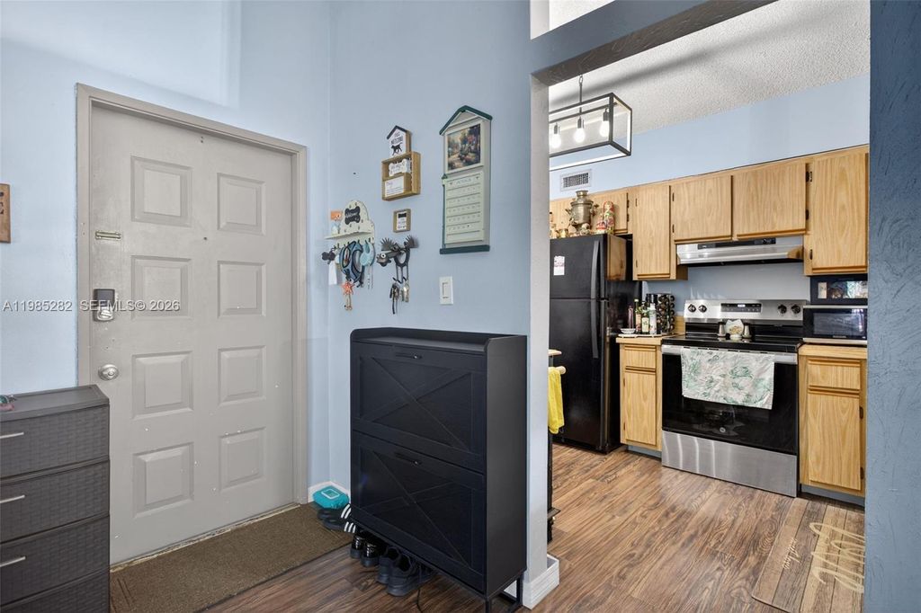 Photo of 3001 N Oakland Forest Dr #302, Oakland Park, FL 33309 (MLS # A11985282)