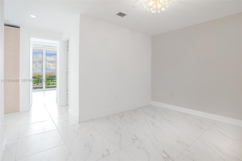 Photo of 2000 Metropica Way #2501, Sunrise, FL 33323 (MLS # A11934448)