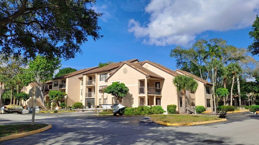 Photo of 4521 W Mcnab Rd #30, Pompano Beach, FL 33069 (MLS # A12025250)