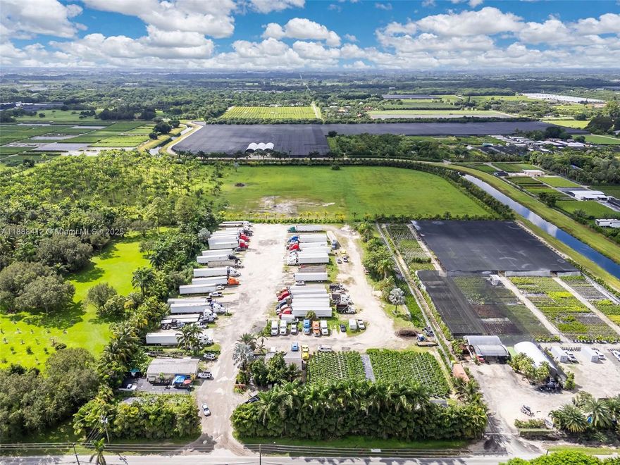 The ideal 4.806 acre location for any business to start or expand any size operation with high traffic visibility being on Quail Roost/200st. The property is fenced on all 4 sides with power and water on site. Need more space? The rear 24.394 acres area also for sale with canal frontage. Additional folio #'s available 30-6909-000-0043, 30-6909-000-0043, 30-6909-000-0045, 30-6909-000-0041. The homes pictured have been digitally added for reference.