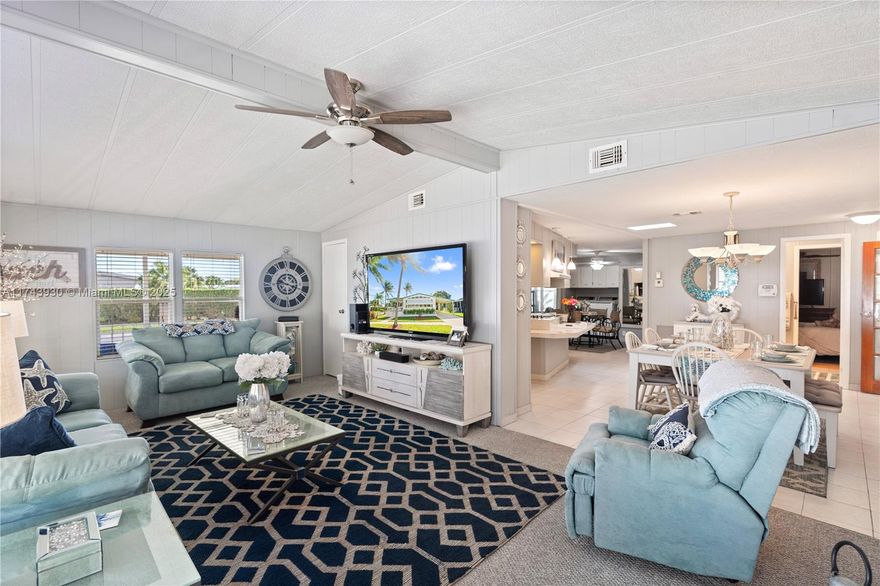 "PREVIOUS SALES CENTER MODEL" **Own the Land** This spacious 2-bedroom, 2-bathroom manufactured home sits on an oversized corner lot in the desirable 55+ gated community of Highland Meadows Estates. Featuring an open island kitchen with newer appliances, fireplace, and tons of storage. Large master bedroom, Master Bath features a jacuzzi tub and shower with dual sinks, walk in closets. The massive Florida room can be converted into a third bedroom with its own separate/entrance. This home offers both comfort and functionality. Enjoy ample natural light, a long covered driveway, front and back porches, and a storage shed building for extra space. Community amenities includes a clubhouse, heated pool, gym and tennis courts, all within your backyard.