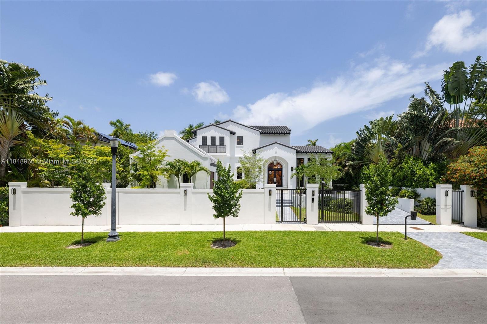 Brand new custom-built single family 4,823 sf home (per architectural plans) on rare 10,900+ sf lot located in prime North Bay Road.
This architectural gem boasts cathedral and tray ceilings, a dramatic white marble staircase, and is fully furnished with high end interiors and custom lighting.
The home features 3–4 bedrooms, including a lavish primary suite with balcony, sitting area, luxurious bathroom, and walk-in closets.
The chef’s kitchen includes a bar area, high-end appliances, and bespoke finishes. Other features include: Outdoor kitchen hook up ready for customization, integrated sound, lighting, and speaker systems controlled by a smart system, gated property for privacy and security, and two-car air-conditioned garage. Just steps to Sunset Harbour’s shops and restaurants.