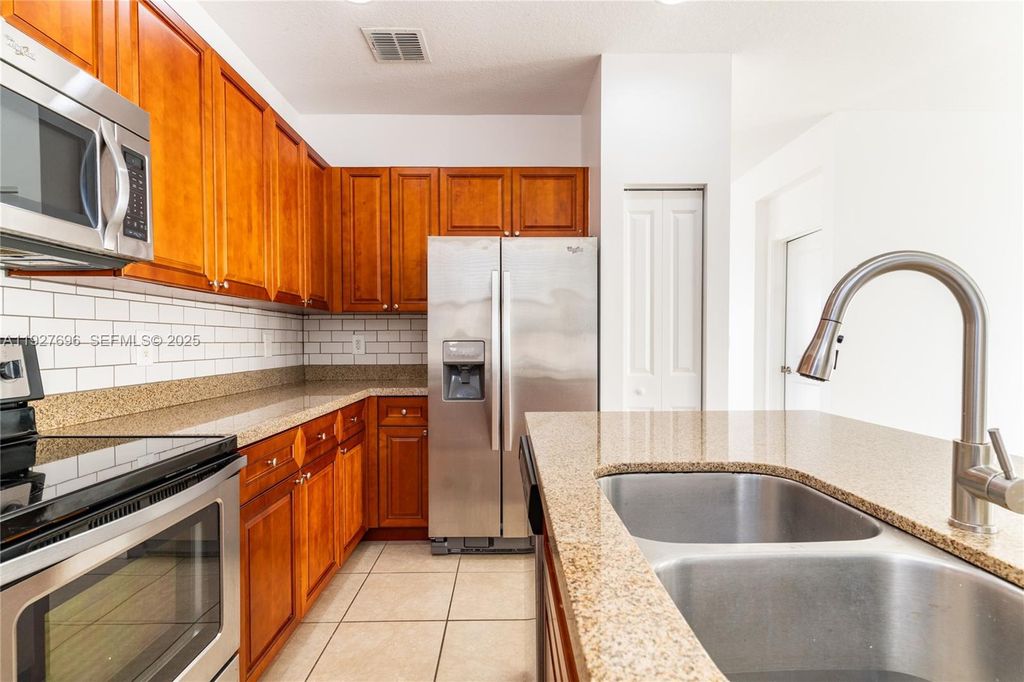 Photo of 4638 NW 59th St, Tamarac, FL 33319 (MLS # A11927696)