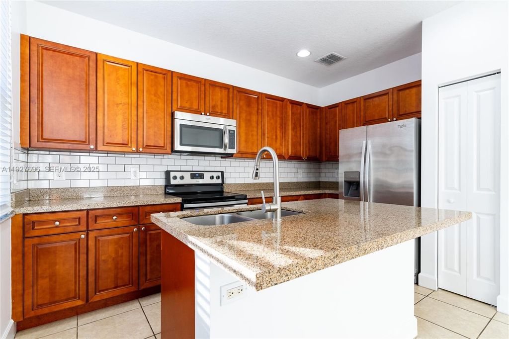 Photo of 4638 NW 59th St, Tamarac, FL 33319 (MLS # A11927696)