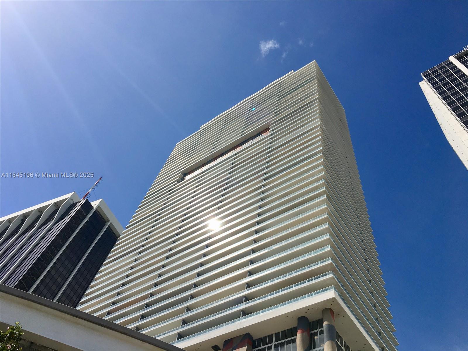 Live all the up. Soaring 48 floors above the epicenter of Downtown Miami, this executive studio has some of the most incredible views from floor to ceiling windows. High end finishes throughout, a walk in closet, and a balcony that stretches the full length of the condo make this a perfect place to call home. Enjoy top tier amenities including a resort style pool & jacuzzi with cabanas, a state of the art fitness center & spa, along with 24 hour service. Just outside the lobby, the famous Bayfront Park, and endless dining and shopping options within blocks. Available NOW!
