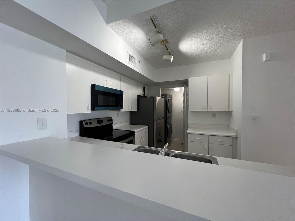 Photo of 2640 S University Dr #320, Davie, FL 33328 (MLS # A11839368)