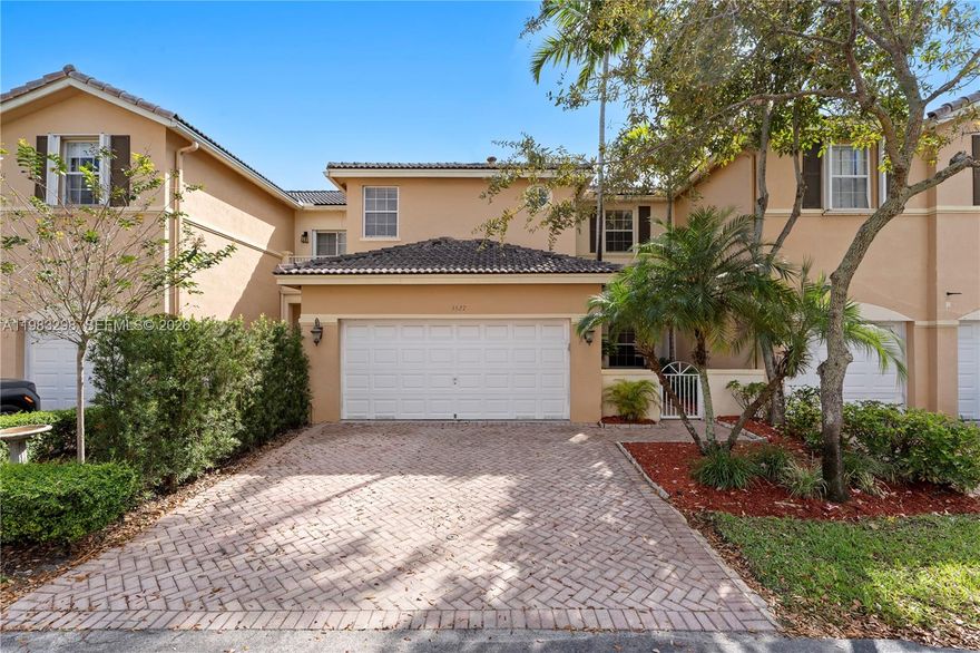 Beautifully maintained townhome in the desirable Cascadas at Doral. This spacious two-story residence offers 3 bedrooms and 2.5 bathrooms with 2,226 sq ft of living space. The home is filled with natural light, creating a bright and welcoming atmosphere throughout. Features include two covered parking spaces plus two additional exterior parking spaces, generous living areas, and a functional layout perfect for comfortable living and entertaining. Newer AC unit and water heater.  Ideally located directly across from the pool, allowing for convenient access to community amenities. Situated in a central Doral location, close to major highways, shopping, restaurants, and excellent schools.