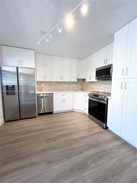 Photo of 6085 N Sabal Palm Blvd #308, Tamarac, FL 33319 (MLS # A11783968)