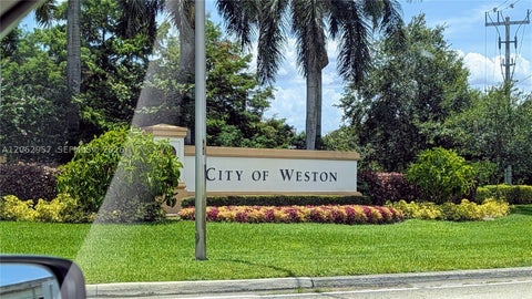 Photo of 2231 N Cordoba Bnd, Weston, FL 33327 (MLS # A12062957)