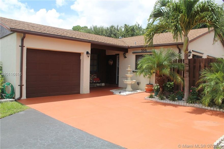 Run Don't Walk! to this immaculate home in sought after Mirror Lake. This unit features a magnificent location right at the entrance of the community. Extended driveway with parking up to 4 cars. Lushly landscaped, fruit trees, and very well maintained. Hurricane shutters through out. Fantastic split bedroom plan, open space living areas and covered screened patio. Low HOA at $122 a month. This home is a rare find, must see ASAP.