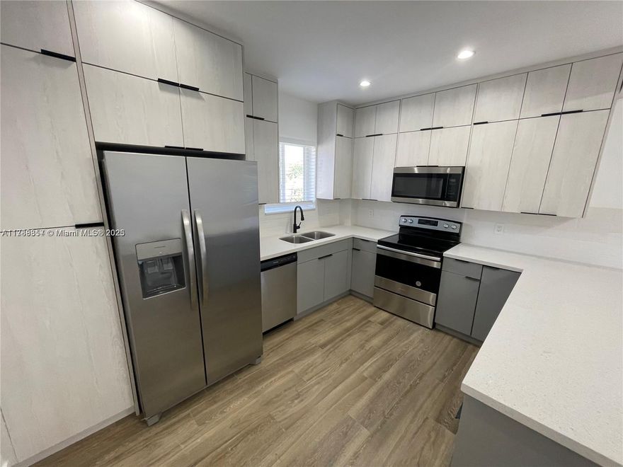 Stunning fully remodeled property! As soon as you walk into the property you'll be greeted by a large living room with plenty of natural lightening. Beautiful two toned kitchen with black fixtures, stainless steel appliances and quartz countertops. Large & spacious tiled balcony will have an aluminum roof installed. Aluminum railings are newly installed. Additional area before the balcony can be conveniently used as an office or storage. Additional features includes recessed lighting, built-in closets, tile floors, impact windows & doors and more. Perfectly situated five minutes from Brickell, Calle Ocho and I-95. Rare spacious find! Property is located on the second floor
