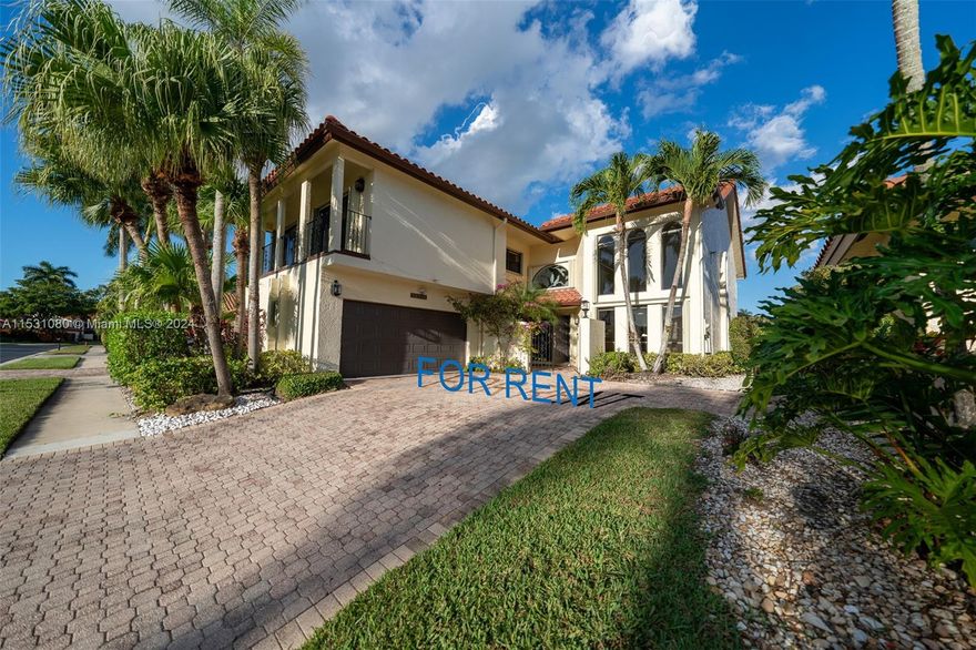 A magnificent home that is a true luxury living. Known for its top-rated schools and exclusive ambiance. This expansive property boasts an impressive 5,196 square feet of total living space in sophistication and modern elegance. Five generously sized bedrooms, Plus a dedicated media room. Step inside to discover high ceilings throughout, creating an atmosphere of grandeur and openness. The huge living room seamlessly transitions into a cozy family room, The dining room, along with a charming breakfast area, The heart of this home is undoubtedly its private outdoor oasis. A screened backyard, complete with a pristine pool, barbecue, and full outdoor kitchen, overlooks a serene lake, The large balcony, accessible from the upper levels, provides panoramic views of the surrounding beauty.