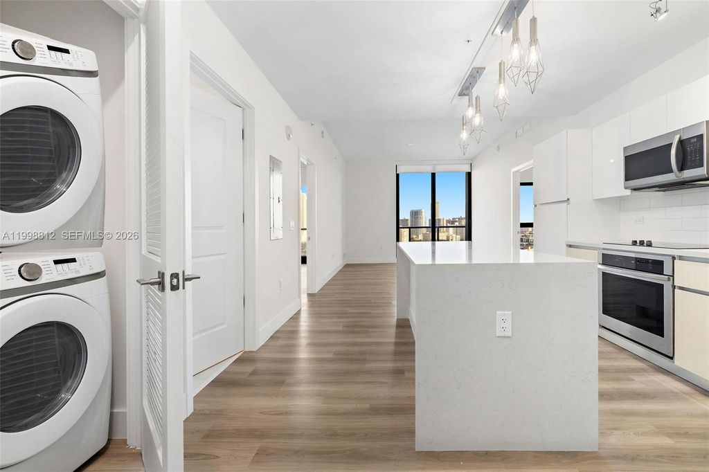 Photo of 101 Diplomat Pkwy #1004, Hallandale Beach, FL 33009 (MLS # A11998812)