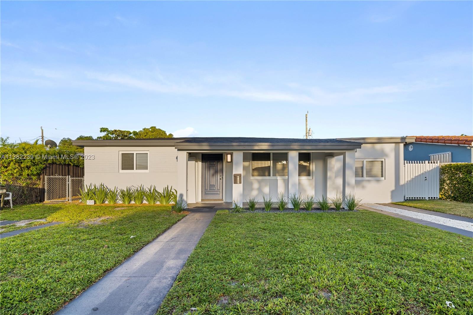 VERY SPACIOUS and FLEXIBLE FLOORPLAN ready to accommodate a large family OR generate amazing cash flow. ALL NEW ROOF and IMPACT WINDOWS (front) and accordion storm shutters (sides & back) SAVING YOU $$$ ON THE INSURANCE. ALL NEW AC;s and ductwork, NEW FLOORING, millwork & more. This LIGHT & BRIGHT home features, OVERSIZED WINDOWS and boasts 5 BEDROOMS/ 3 BATHROOMS. One of the bathrooms is fully renovated, the second and third bathrooms are partially renovated. This home has an INCREDIBLE LAYOUT with the potential to enjoy the 3 bedrooms in the front & use the 2 HUGE bedrooms in the back & side as APT/ STUDIO's (potentially $3400 month in extra income). There are private walkways and entrances on either side of the home for maximum privacy. FULLY FENCED/ GATED WITH ROOM FOR A POOL!
