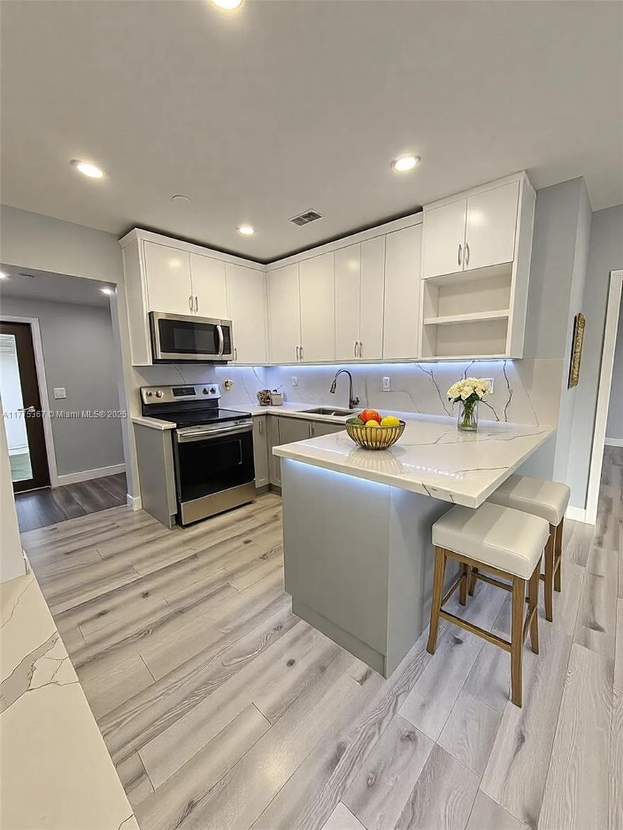 Beautifully updated and fully permitted duplex-style property! Main house is a 2/1 featuring new impact windows/doors, 200 AMP panel, enclosed porch converted to office, new laminate floors, updated kitchen & bath, Nest A/C, tankless water heater, custom closets & Dura fence. Back house is a 1/1, permitted with impact windows/doors, fresh paint, and LED lighting throughout. Ideal for extended family or rental income. Move-in ready – don’t miss this opportunity!  
-Motivated Seller, submit an offer today!