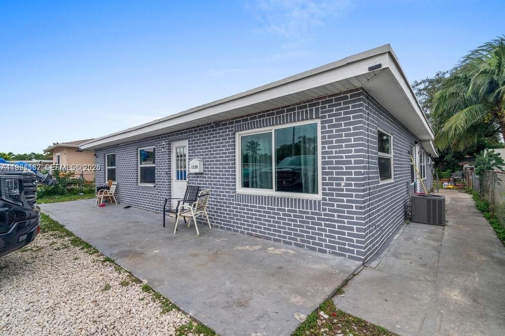 Photo of 1150 SW 24th Ave, Fort Lauderdale, FL 33312 (MLS # A11961137)