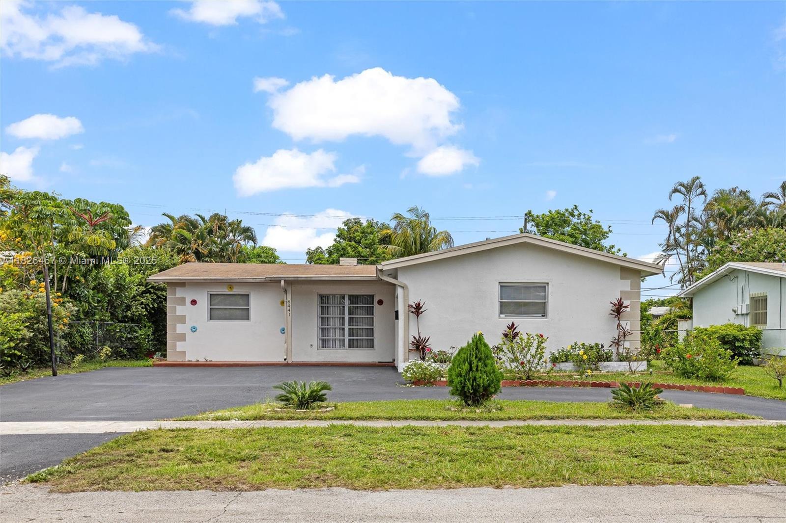 Charming 3 bedrooms /2 bathrooms Home in Sunrise Golf Village, comes with a car garage, Features include a modern kitchen with quartz countertops, backsplash and updated cabinetry, updated bathrooms, and modern tile flooring throughout. Spacious living area, perfect for indoor/outdoor living. Generously sized backyard offers plenty of space for entertaining or relaxing. Conveniently located minutes from Sawgrass Mills Mall, shopping, dining, and major highways. No HOA.