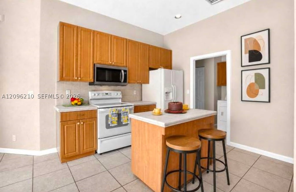 Photo of 9954 Boynton Gardens Way #0, Boynton Beach, FL 33437 (MLS # A12096210)