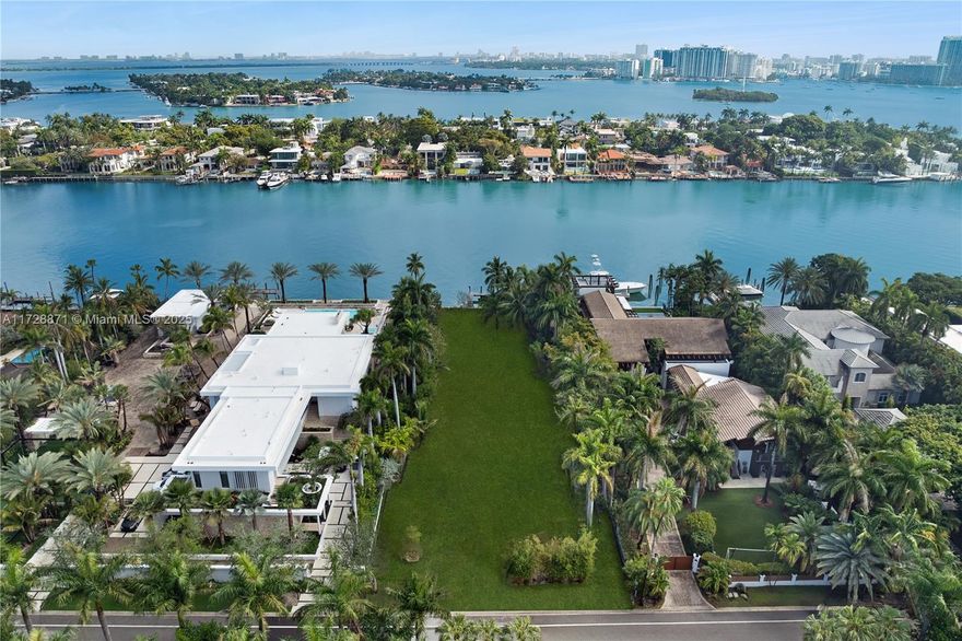Discover the pinnacle of luxury living with this rare 30,000-square-foot lot featuring 100 feet of breathtaking Miami Beach waterfront on the prestigious and guard-gated Palm Island. Immerse yourself in lush tropical surroundings while being just minutes away from the vibrant energy of South Beach, Downtown Miami, and both major and private airports. This exclusive property is ready for you to design and build your dream waterfront estate, where endless possibilities await. Don't miss the opportunity to own a slice of paradise in one of Miami's most sought-after locations.