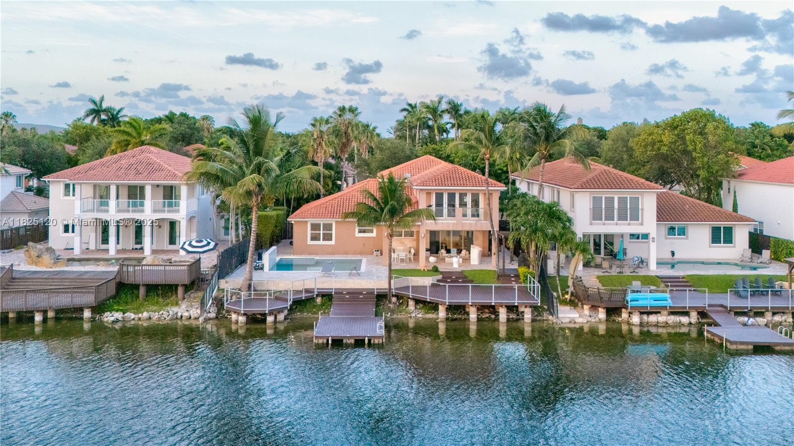 Spectacular Lakefront Home for Rent in Doral Isles. Located in the prestigious community of Doral Isles, offers 5 bedrooms and 5.5 baths. One of its main highlights is the breathtaking lake view, perfect for enjoying unforgettable sunsets. Inside, you’ll find elegant marble flooring and a dream kitchen by Mia Cucina, equipped with Sub-Zero appliances. The home also features a spacious living room, dining area, and a luxurious primary suite with dual walk-in closets. Outside, a heated pool and panoramic lake views create the perfect setting for relaxation and entertaining. Situated in one of Doral’s most desirable areas, it is surrounded by top public and private schools and boasts a strategic location, just 15 minutes from Miami International Airport.