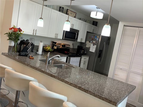 Tiny photo for 8660 SW 212th St #305, Cutler Bay, FL 33189 (MLS # A12043589)