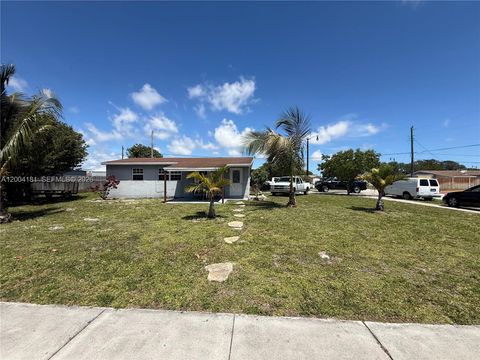 Photo of 1701 NW 6th Ave, Pompano Beach, FL 33060 (MLS # A12004181)