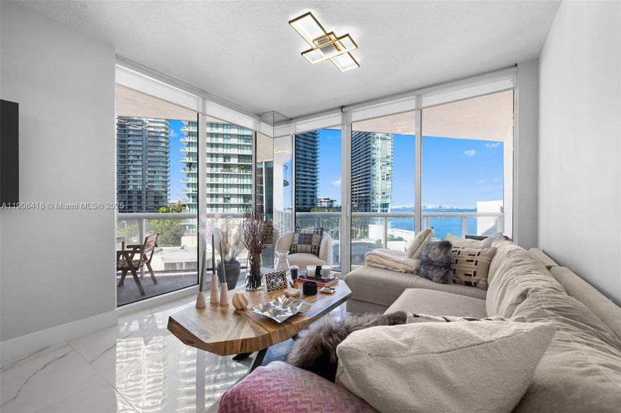 Welcome home to this beautifully remodeled one-bedroom, one-and-a-half-bathroom residence in Edgewater. Enjoy breathtaking bay and city views from the two spacious balconies, bedroom, and living area. Floor-to-ceiling glass fills the space with abundant natural light. Step onto your private balcony to unwind and take in the stunning views— the perfect way to begin and end your day. A custom CellArtus wine cellar with a 300-bottle capacity adds a touch of sophistication. Platinum Condominium is a boutique building offering fantastic amenities, including a large pool area, exercise room, sauna, steam room, business center, and community room. Ideally located just minutes from shopping, dining, and entertainment in the Design District, Midtown, Wynwood, and Miami Beach!