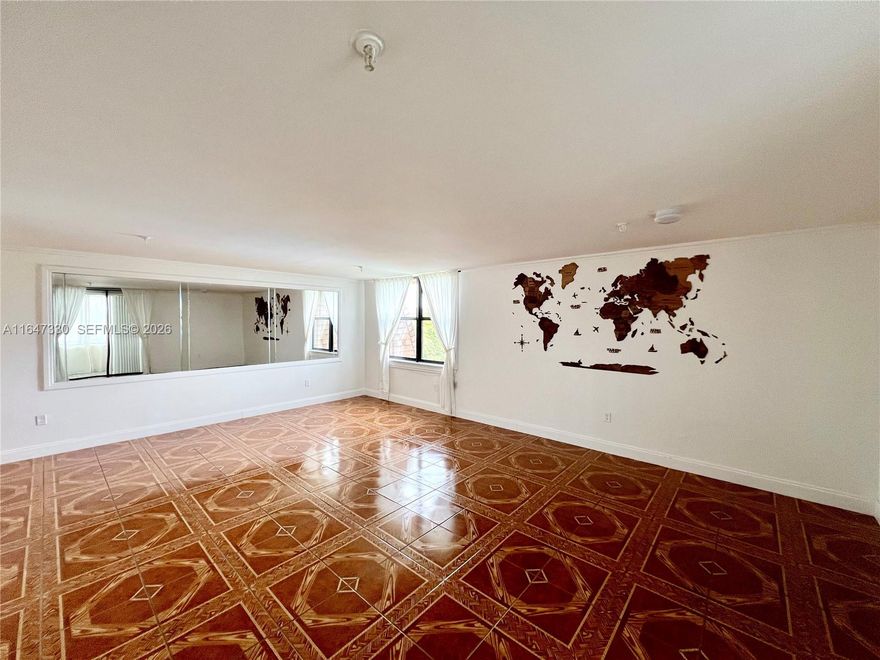 Price improved! Bright top-floor corner residence with beautiful lake and green area views. Spacious layout featuring three walk-in closets, new impact windows and updated plumbing. Located in a well-maintained and peaceful community with pool, gym, and sauna. Low HOA compared to nearby buildings. Vacant and easy to show. Seller offering $5,000 credit toward buyer closing costs with acceptable offer.