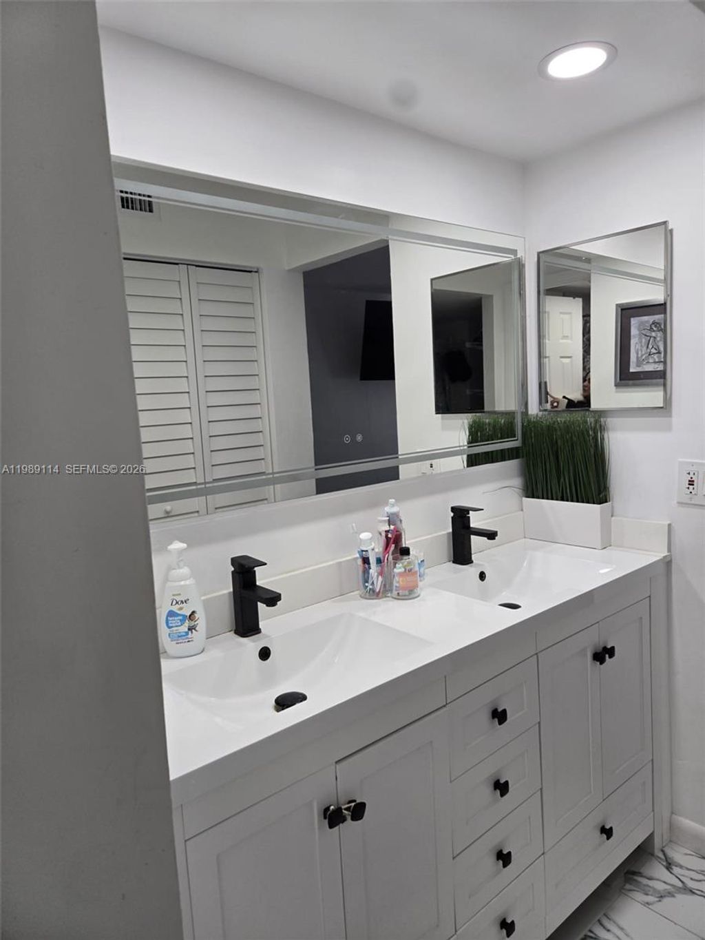 Photo of 6195 Rock Island Rd #409, Tamarac, FL 33319 (MLS # A11989114)