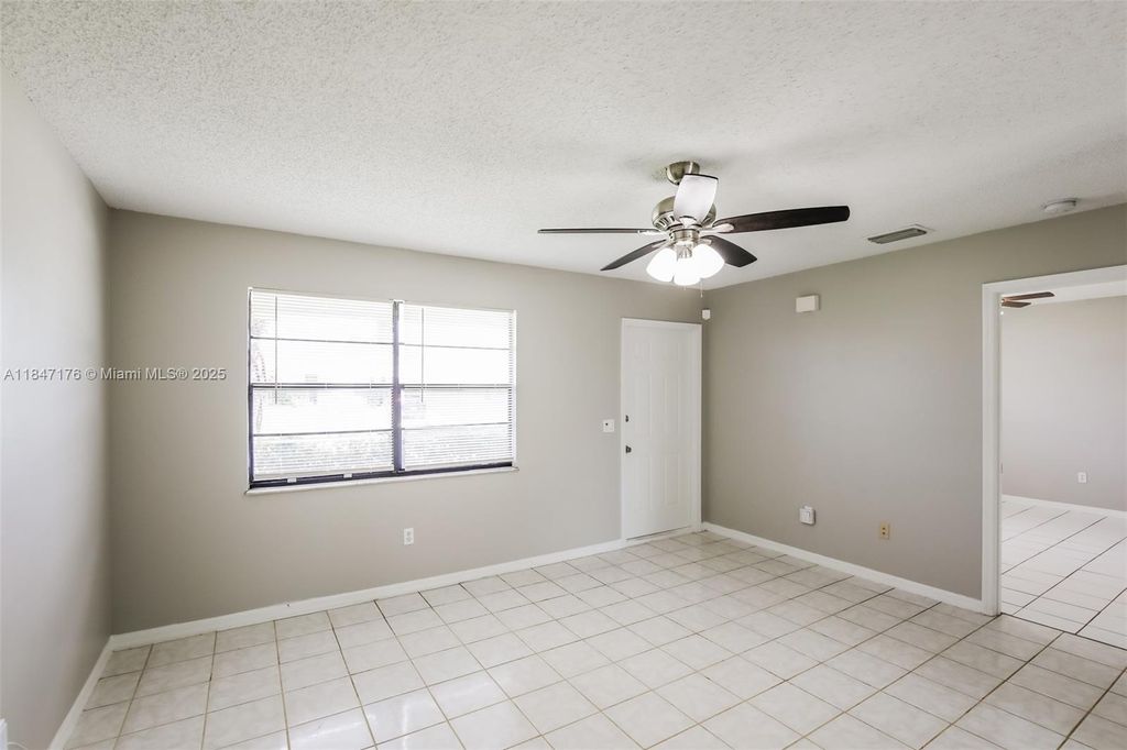 Photo of 1252 SW Goodman Ave, Port St Lucie, FL 34953 (MLS # A11847176)