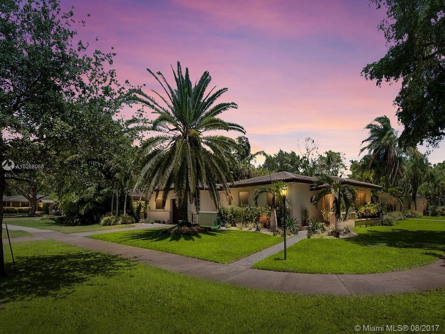 Situated on an expansive corner lot on one of Coral Gables most coveted streets, this gorgeous 5 bedroom, 3 bathroom residence is perfect for your family&#x2019;s new memories for years to come. A combination of marble and wood floors throughout lead you from room to room to the updated eat-in kitchen and out to the tropical backyard complete with an alluring pool and areas designed for entertaining. Large windows and an open floor plan effortlessly collaborate to bring in natural light through the entire home. Enjoy views of the lush landscapes that cradle the home from every corner on almost half an acre of land. Close to MIA Airport, Downtown Miami and the Beaches. Just steps from the Shops at Merrick Park and Downtown Coral Gables.  A must view!