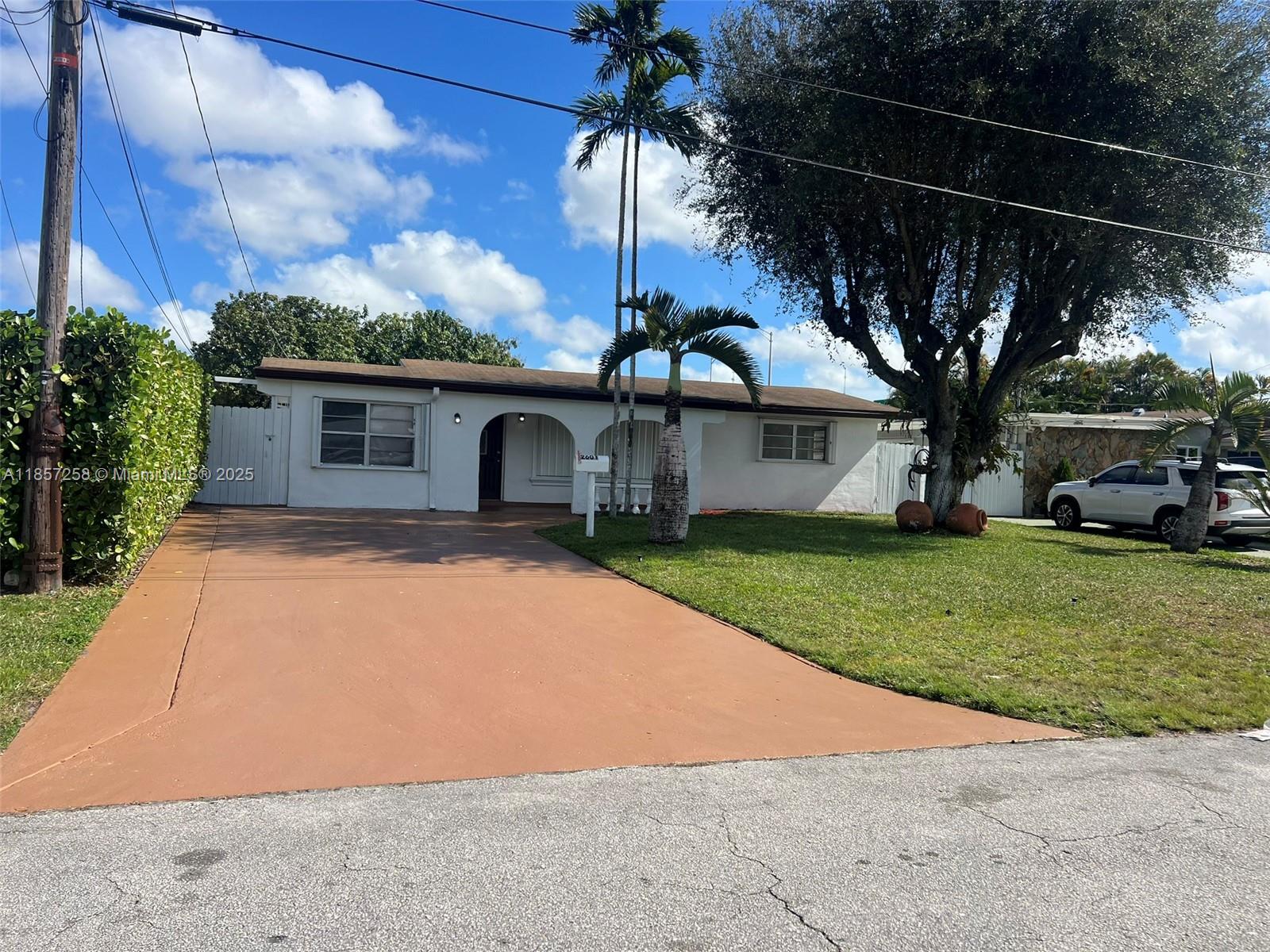 Spacious and conveniently located pool home close to schools, shopping areas and major highways. Immaculate condition, freshly painted and recently upgraded, home is ready to move in! Unfurnished, annual leases only. NOTE Attached efficiency with no access to main house is currently rented.
