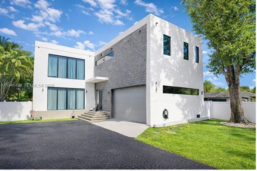 Brand-new 2024 concrete construction, designed for durability, efficiency, and modern living. This eco-friendly home offers exceptional strength and long-term value. Featuring 5,293 square feet, the property includes a double garage, two kitchens, a summer kitchen, and a 15’ x 40’ swimming pool with cabana bathroom, making it ideal for entertaining. The home is in impeccable condition, move-in ready, and benefits from very low property insurance costs. 2 MINUTES WALKING TO SYNAGOGUE AND KOSHER RESTAURANTS.